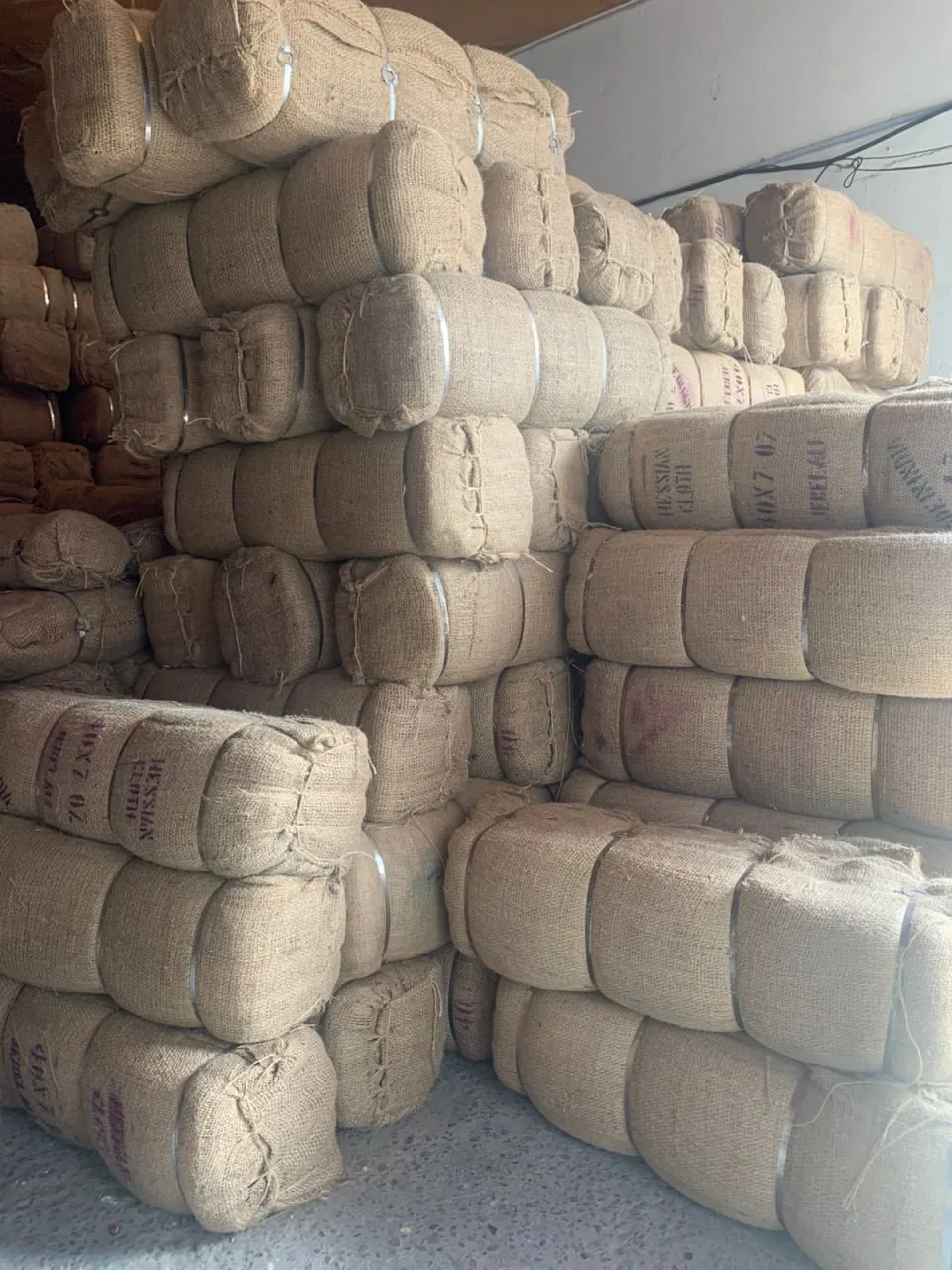 Hessian cloth bales stacked